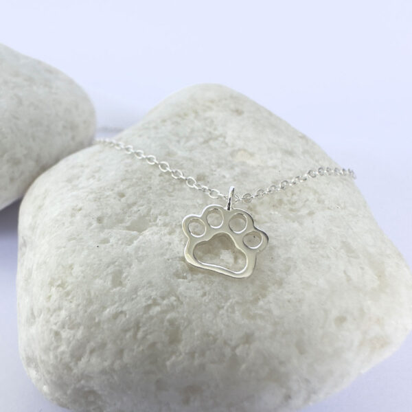 Silver anklet with a cute pawprint.