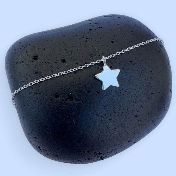 Anklet with solid silver star charm.