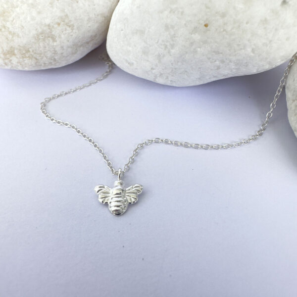 Sterling silver anklet with a silver bee charm.
