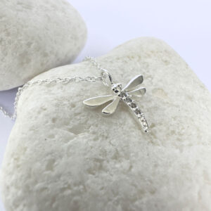 Stunning silver anklet of a dragonfly with cubic zirconia stones detail.