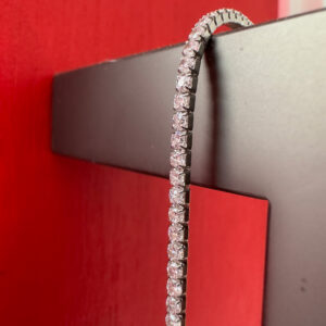 Stunning silver tennis style anklet with white cubic zirconia stones all the way around.