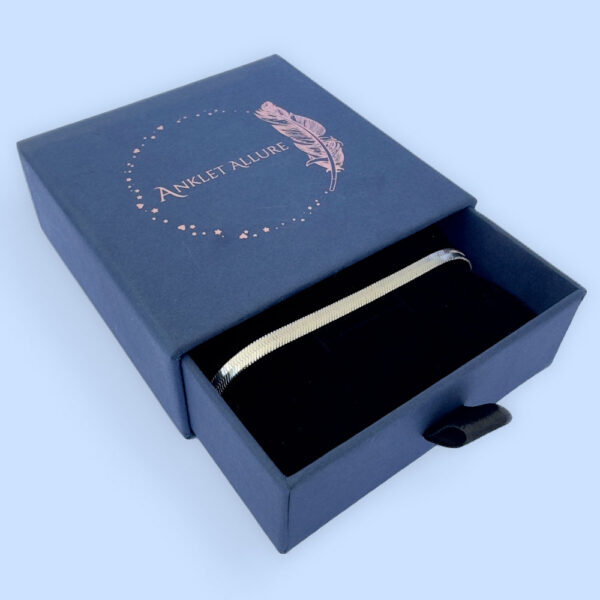 Thick silver snake chain anklet in a blue Anklet Allure jewellery box.
