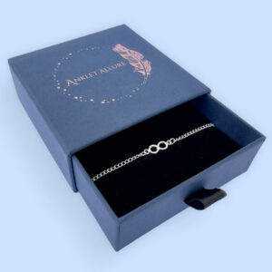 Chunky silver infinity chain anklet presented in a blue Anklet Allure jewellery box.